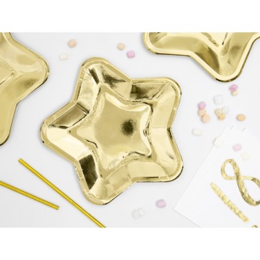 Bordjes in de vorm van gouden sterren voor kerst, nieuwjaar of een ruimtefeestje
